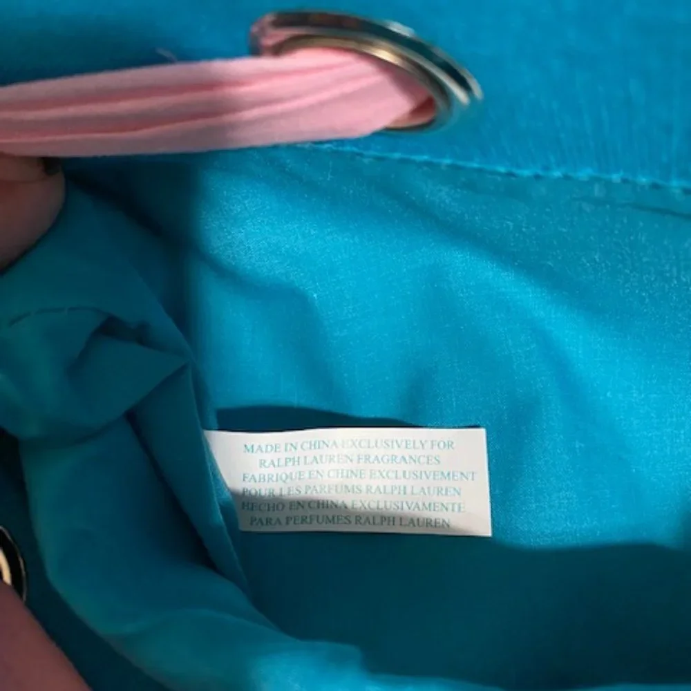 Cute bag. Blue with pink ribbon. Ralph tag. 12